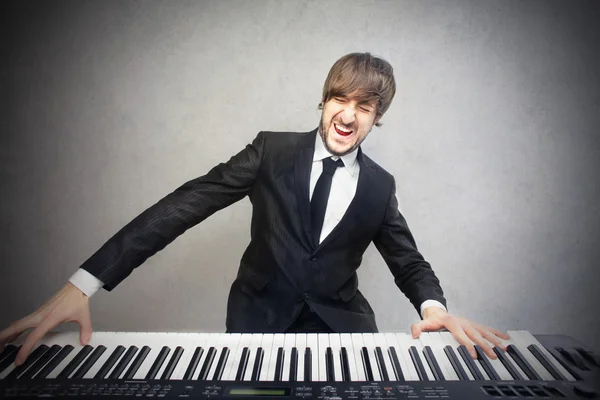 Man playing the piano — Stock Photo, Image