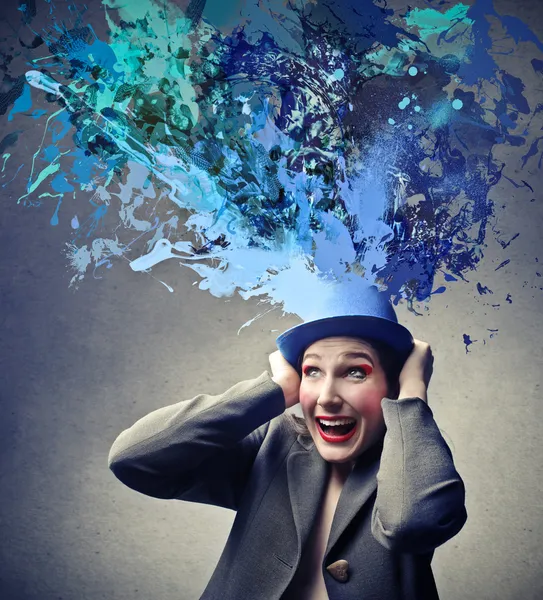 Woman holding a hat — Stock Photo, Image