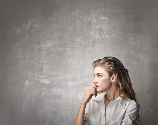 Thinking young woman — Stock Photo, Image