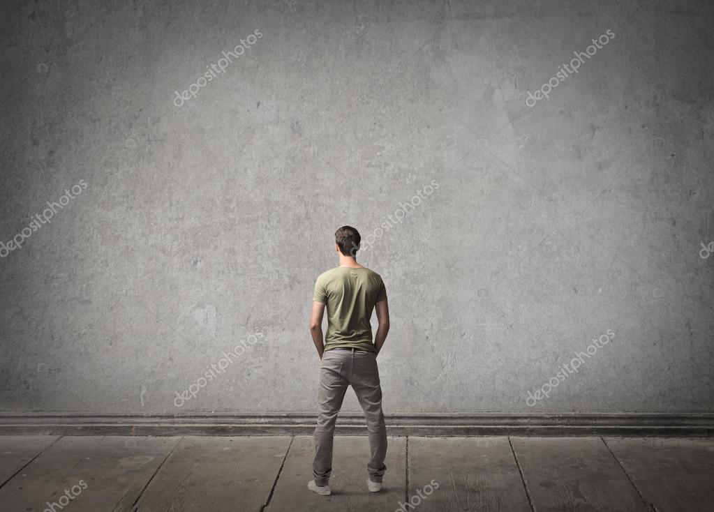 Man looking at a wall — Stock Photo © olly18 29596431