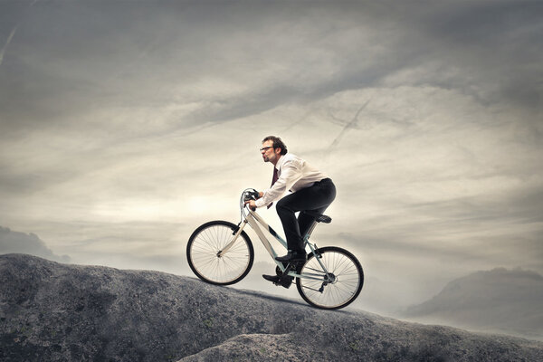 Businessman cycling