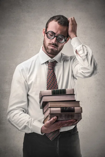 Businessman studying hard — Stock Photo, Image