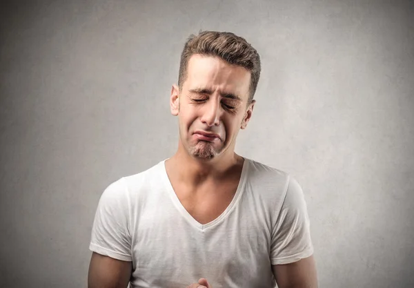 Sad young man crying — Stock Photo, Image