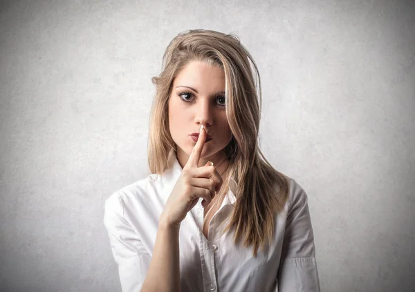 Woman saying to be quite — Stock Photo, Image