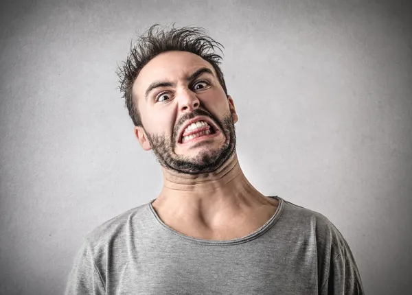 Hombre con expresión asquerosa — Foto de Stock