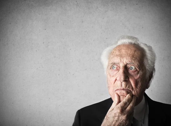 Old man thinking — Stock Photo, Image