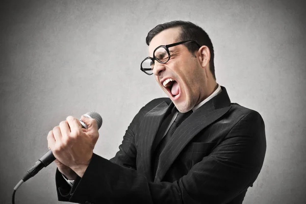 Businessman singing — Stock Photo, Image