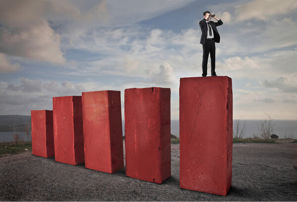 Businessman using a binoculars