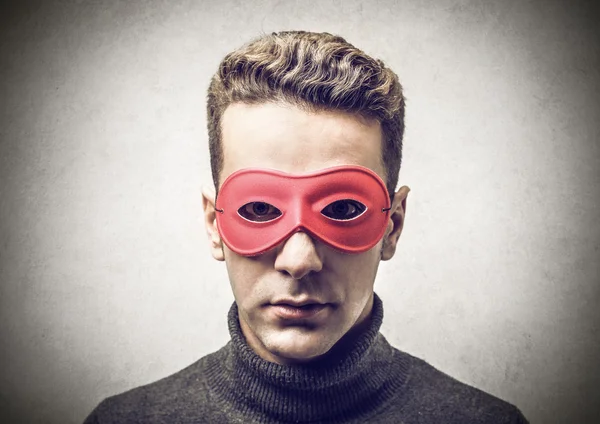 Young man wearing a mask — Stock Photo, Image