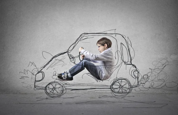 Child pretending to be a driver — Stock Photo, Image