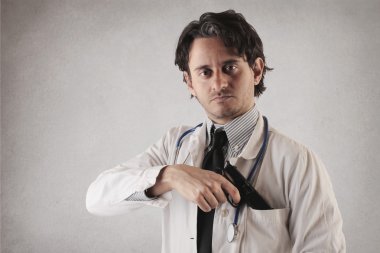 Serious doctor with a gun clipart