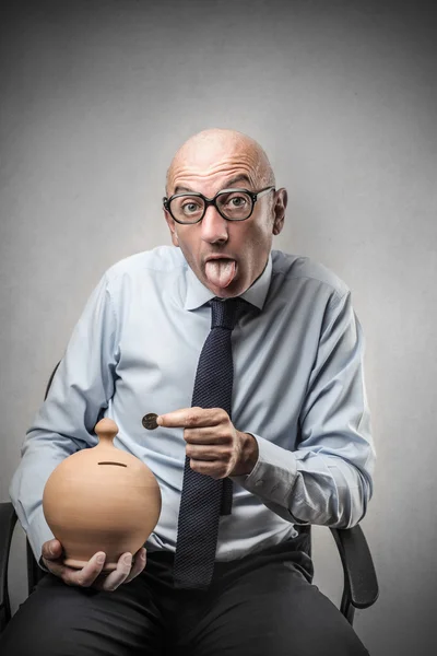 Businessman with a moneybox — Stock Photo, Image