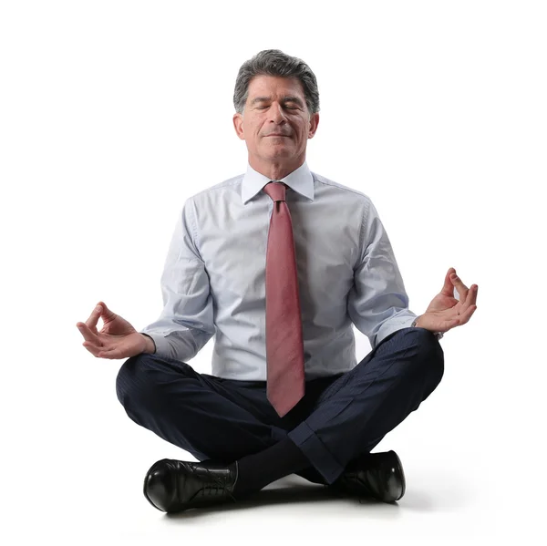 Businessman doing some yoga — Stock Photo, Image
