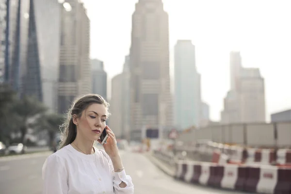 Young Woman Telephones City — Photo