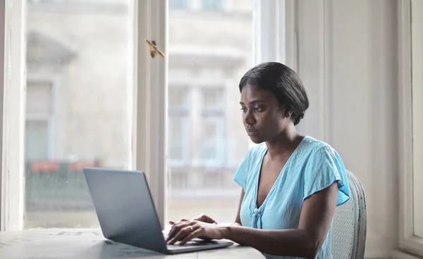 Young Woman Works Computer Home — стоковое фото