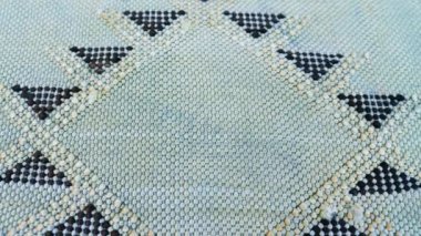 El yapımı, geleneksel, Fas kaktüs ipeği (Sabra ipeği) halı, nane yeşili halı. Makro yakın çekim soyut geometrik desenler.