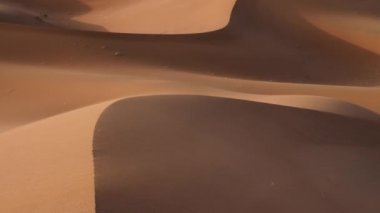 Windy desert sand dunes landscapes in the Sahara desert, Mhamid, Erg Chigaga, Morocco. 4k. 