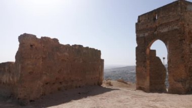 The Marinid tombs (or Merenid) overlooking the Medina of Fez (Fes), Morocco. Landmark, important travel destination, and touristic site of Fes. 4k footage.