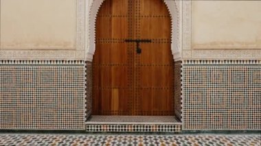 Meknes, Morocco - July 25, 2022: Interior architecture of the Mausoleum of Moulay Ismail. Landmark, attraction, and important travel destination, touristic site of Meknes. 4k footage.