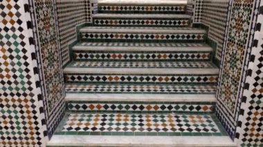 Meknes, Morocco - July 25, 2022: Interior architecture of the Mausoleum of Moulay Ismail. Landmark, attraction, and important travel destination, touristic site of Meknes. 4k footage.