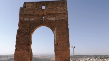 The Marinid tombs (or Merenid) overlooking the Medina of Fez (Fes), Morocco. Landmark, important travel destination, and touristic site of Fes. 4k footage.