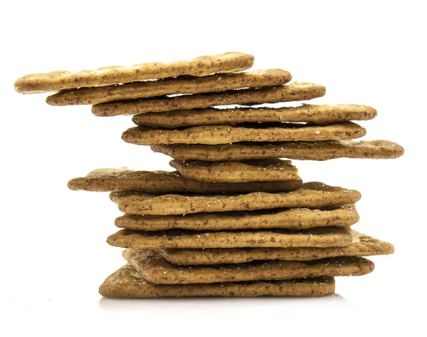 Galletas saladas aisladas sobre fondo blanco —  Fotos de Stock