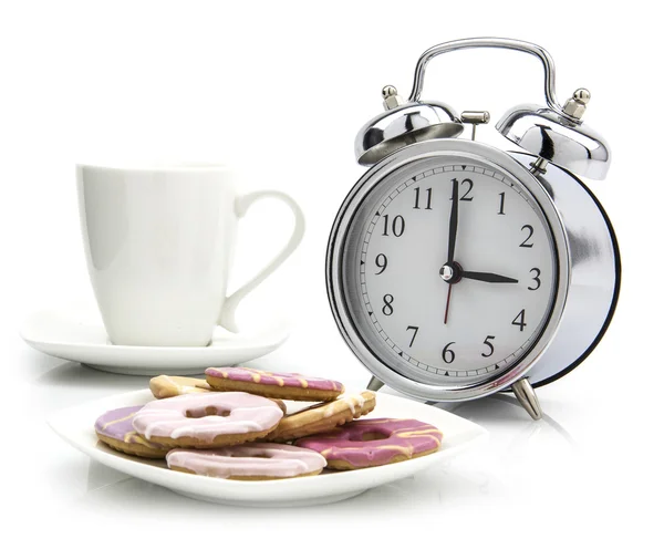 Tea Time old style clock with cup of tea and biscuits — Stock Photo, Image