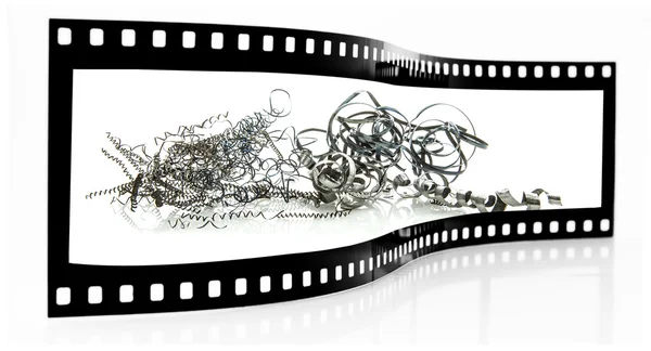 Metalen swarf Filmstrip geïsoleerd op witte achtergrond — Stockfoto