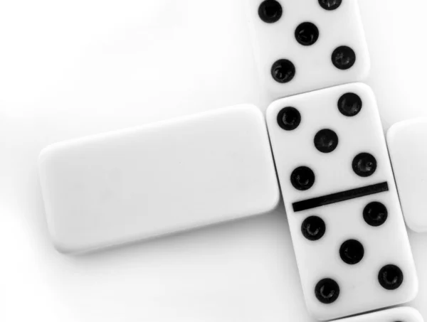 Domino en blanco sobre fondo blanco — Foto de Stock