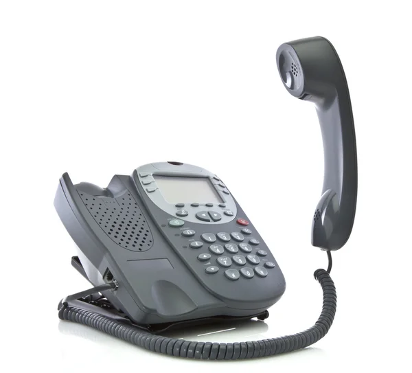 Telefone cinzento do escritório isolado em um fundo branco com floati — Fotografia de Stock