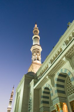 Tower of the Nabawi Mosque at knight. clipart