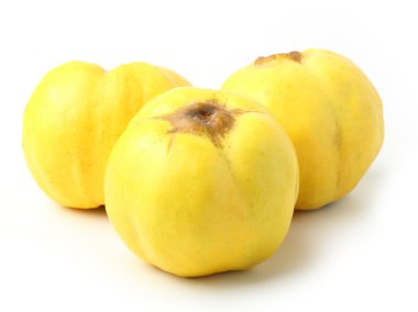 Three quinces on white background