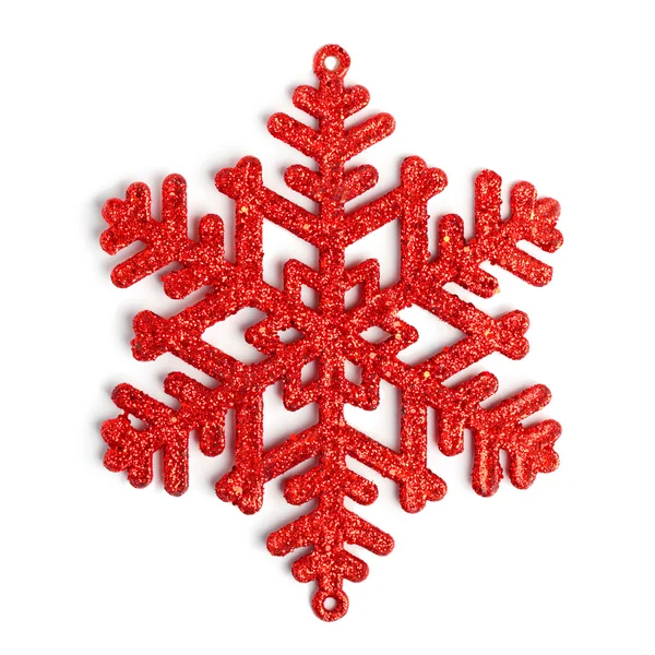 Snowflake decorativa vermelha em fundo branco — Fotografia de Stock