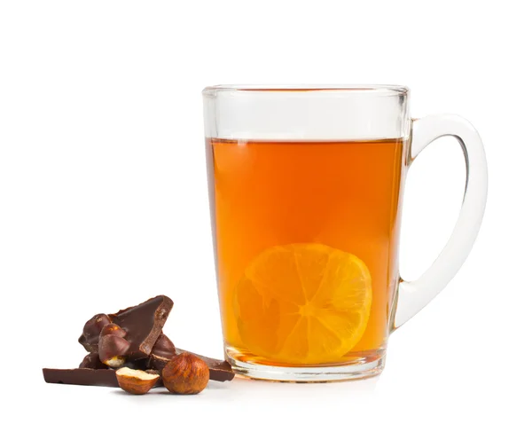 Chocolate com nozes e chá com limão — Fotografia de Stock