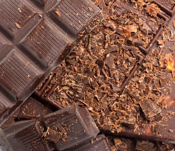 Chocolade als achtergrond voor zoete voedsel — Stockfoto