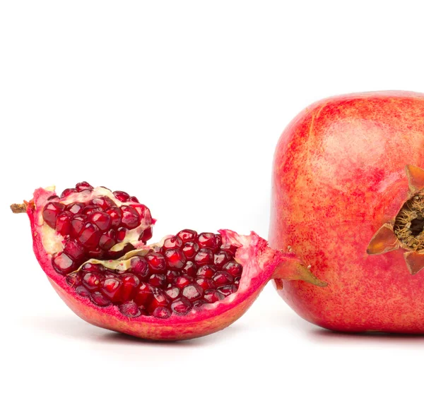 Pomegranate and a slice on white background — Stock Photo, Image