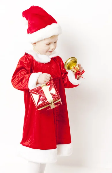 Petite fille comme Père Noël avec des cadeaux de Noël — Photo