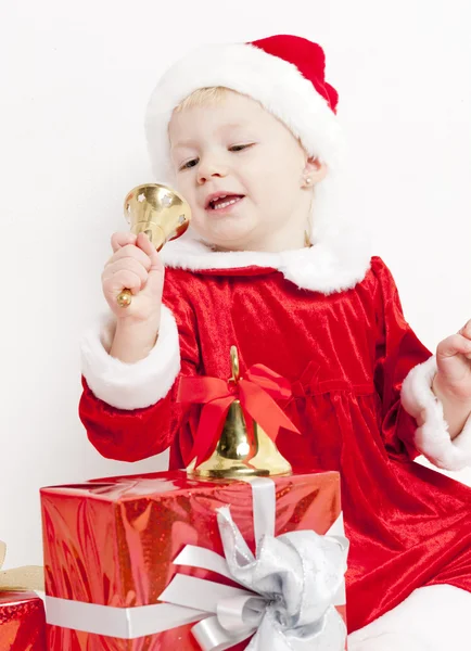 Κοριτσάκι ως Άγιος Βασίλης με τα Χριστούγεννα παρουσιάζει — Φωτογραφία Αρχείου