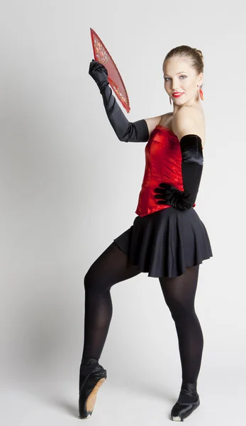 Ballet dancer holding a fan — ストック写真