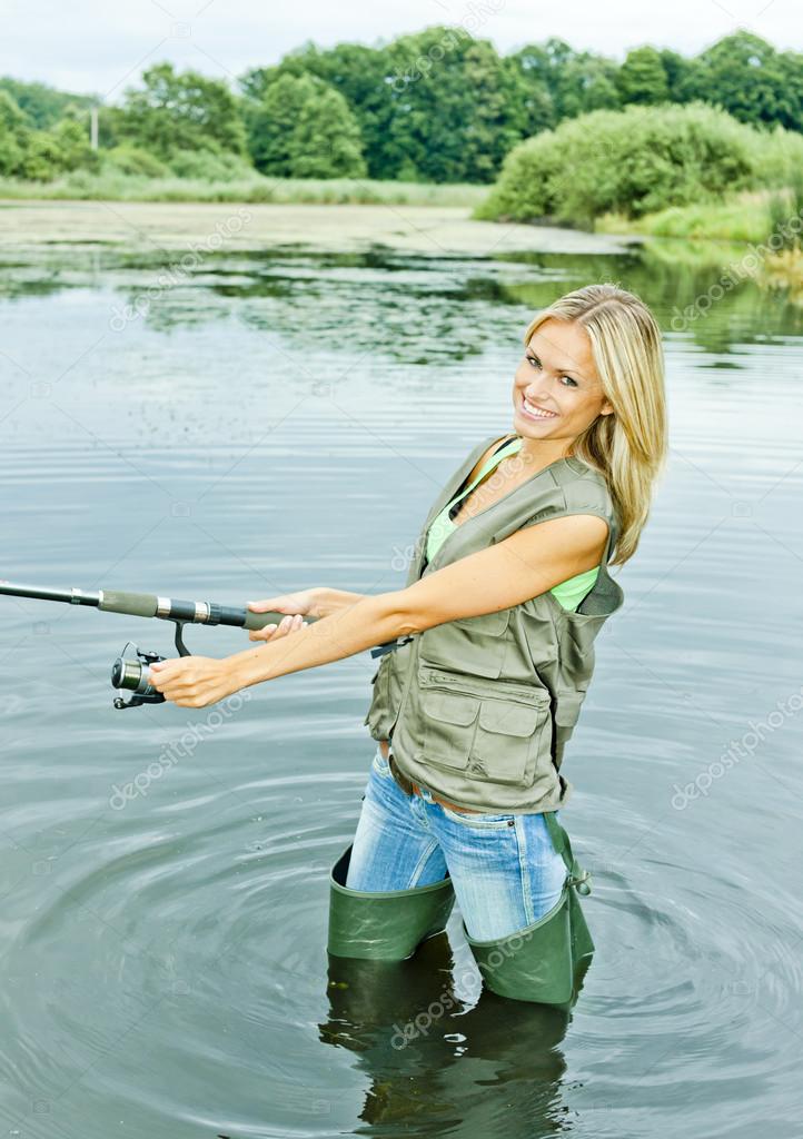 Woman Fishing In Pond Stock Photo, Picture and Royalty Free Image