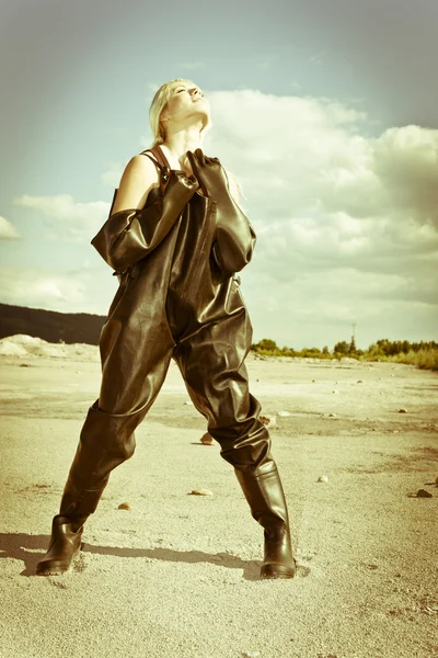 Standing woman with gas mask wearing protective clothes — Stock Photo, Image