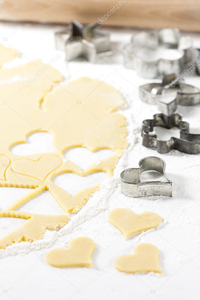 still life of dough with cookie cutters
