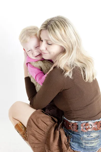 Portrait of mother with her crying little daughter — Stock Photo, Image