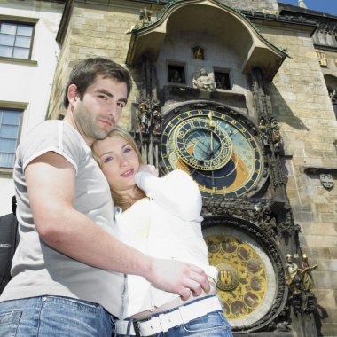 couple in Prague, Horloge, Old Town Hall, Czech Republic clipart