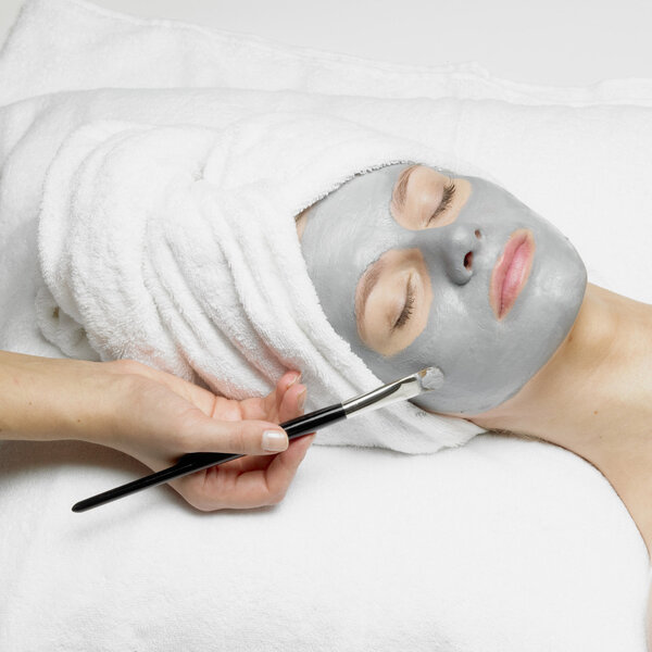 woman with facial mask