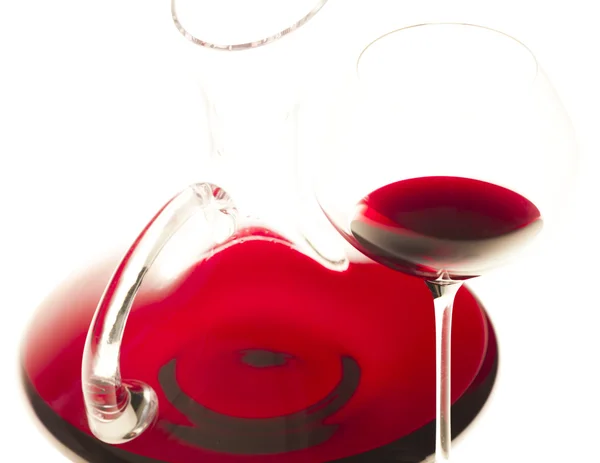 Wine glass and carafe with red wine — Stok Foto