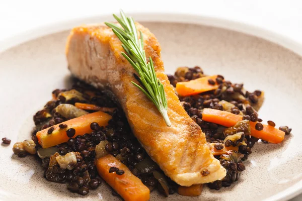 Salmon fillet with lentils and carrot — Stock Photo, Image