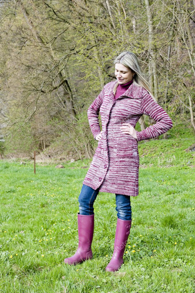 Woman wearing rubber boots in spring nature Stock Photo by ©phb.cz 23607809