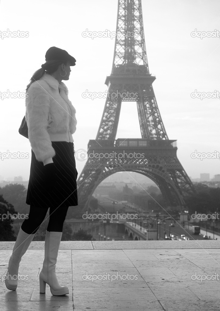 woman and Eiffel Tower, Paris, France