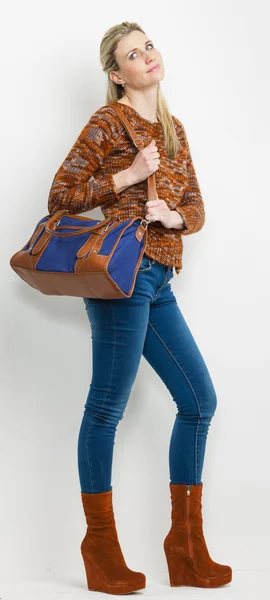 Standing woman wearing fashionable platform brown shoes — Stock Photo, Image